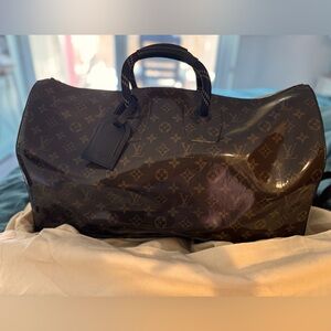 Louis Vuitton duffle bag.